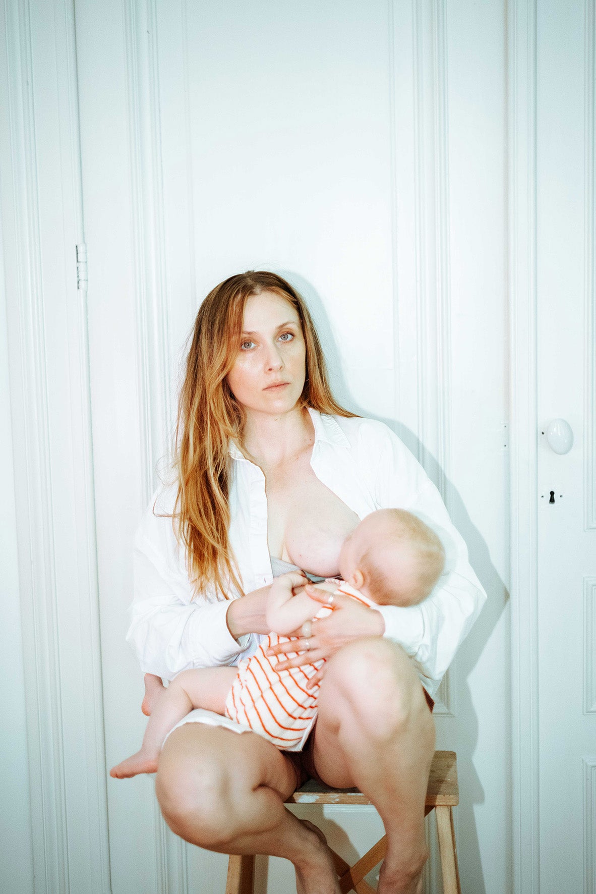 Intimate breastfeeding portraits: Motherhood Bliss